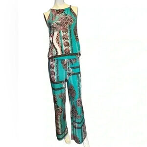 Flirty Pink floral print open back Green jumpsuit Size M